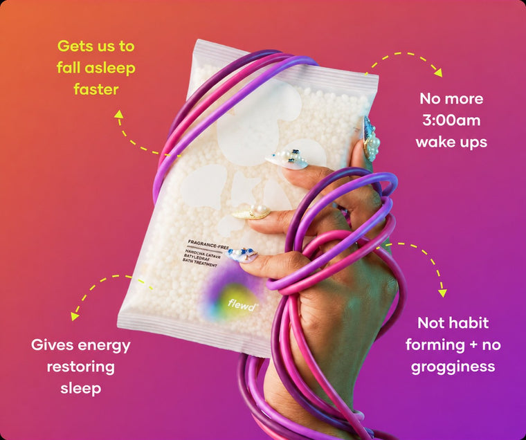 Fragrance-free Insomnia Ending pouch in a hand wrapped in purple cables, part of the Flewd Stresscare Trio