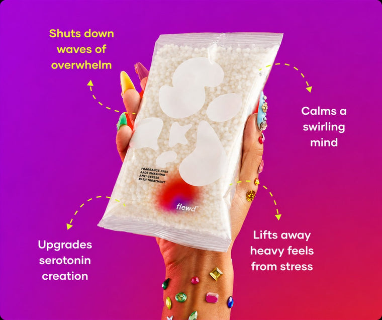 Fragrance-free Sads Smashing pouch in a hand with jeweled nails, part of the Flewd Whole Mood Bundle