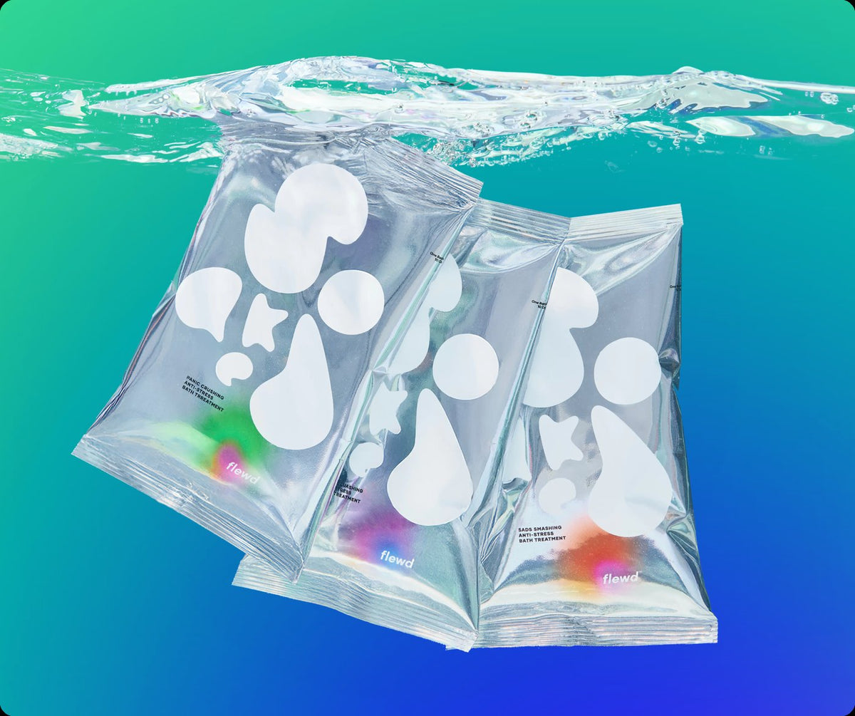 Three Nootropic Trio bath soak pouches underwater