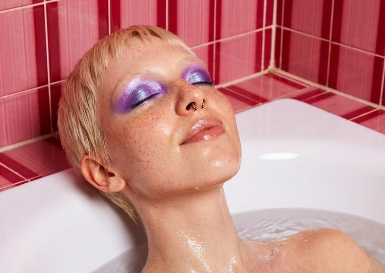 Person relaxing in a bath